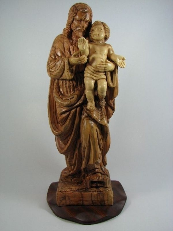 Jospeh holding baby Jesus